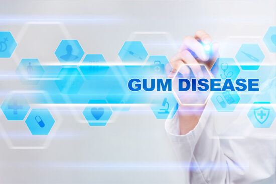 Periodontist drawing gum disease on a virtual screen.
